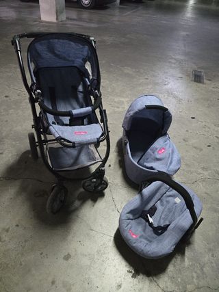 Carrito de bebé y silla de coche azul