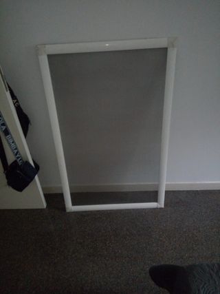 Mosquitera blanca para ventana