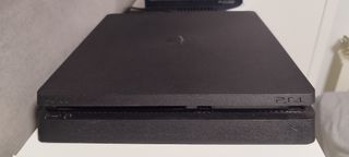 PS4 Slim Negra + 2 Mandos + 8 Juegos