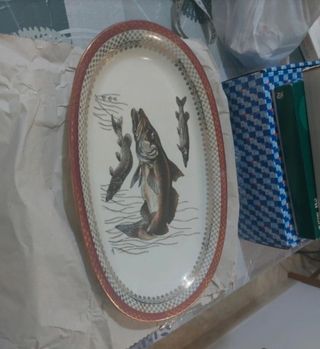 Piatti vintage con pesci decorati
