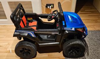 Buggy a bateria con control remoto y 4 motores.