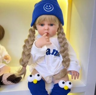 Muñeca Reborn vinilo 60cm Melena Larga Rubia