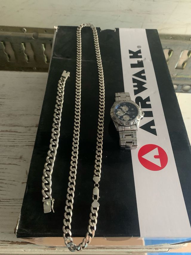 Cadena, pulsera plata y reloj Lotus