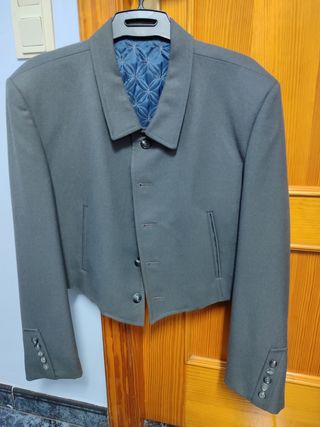 Traje campero gris y

Sombrero