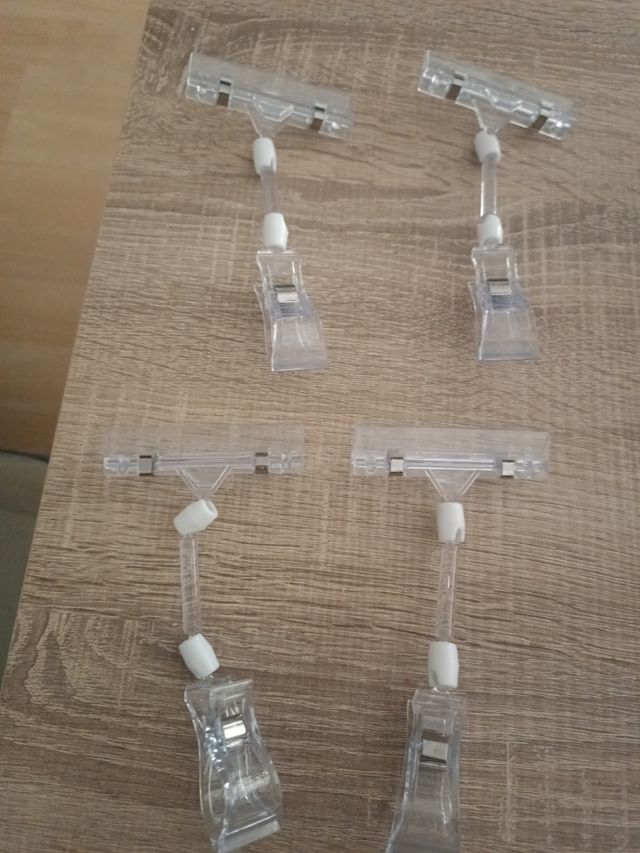 Pinzas transparentes para expositores