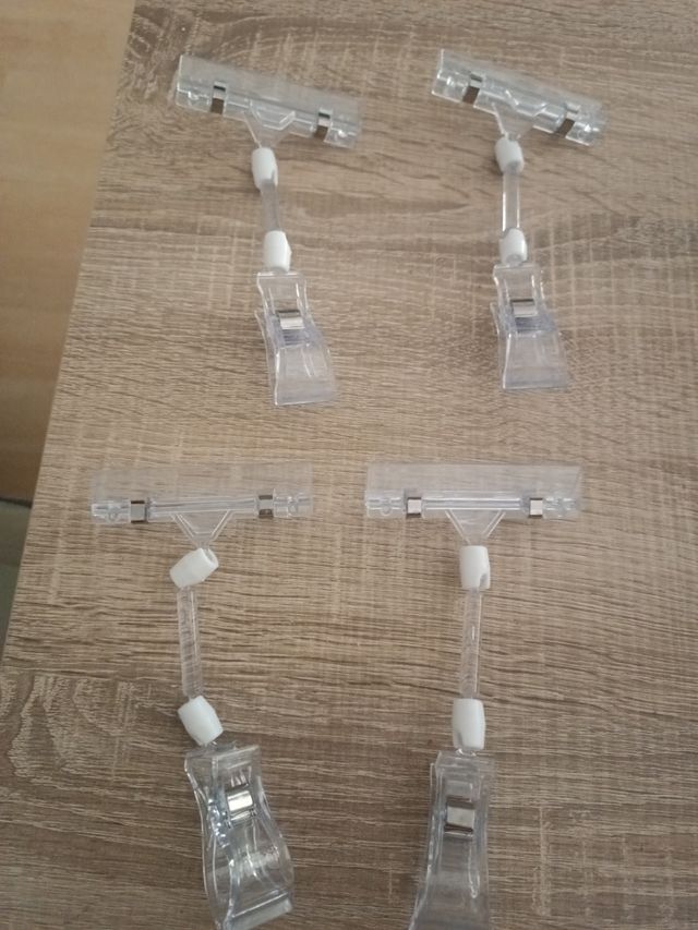 Pinzas transparentes para expositores