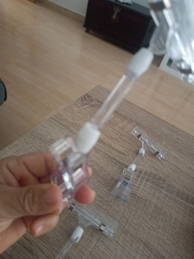 Pinzas transparentes para expositores