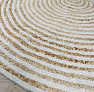 Alfombra redonda de yute beige y blanco