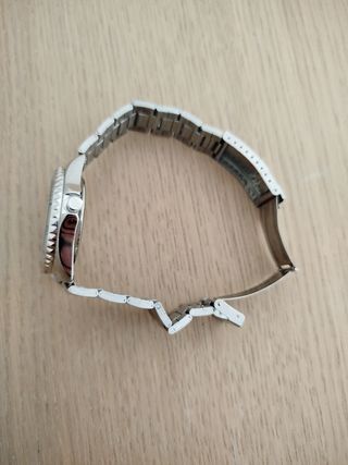 Reloj plateado y blanco unisex