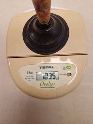 Candelabro antiguo de hierro y madera