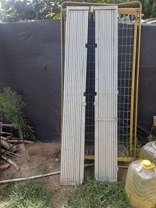 Puerta extensible metálica