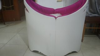 Mini cuna con chichonera rosa y colchón rosa