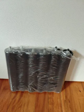 Colchón con una Base tapizada IKEA con patas 