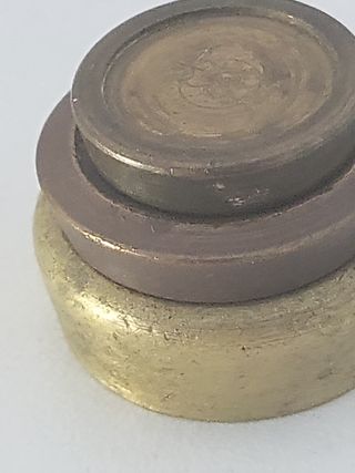 Contrapesos bronce onzas 1/2, 1 y 2