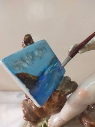 Figura porcelana Salvador Mayoll ángel pintor