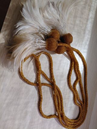 Maniglie per tende con perline dorate piume.