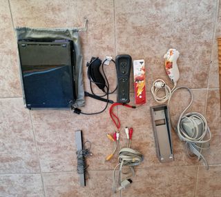 Consola Wii Negra con mandos y juegos