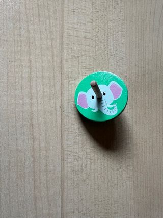 Trottola in legno con elefante
