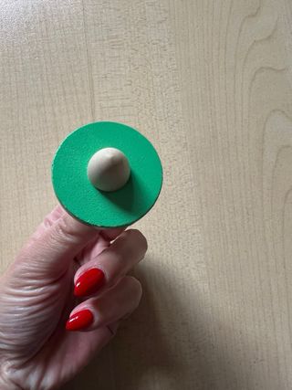 Trottola in legno con elefante