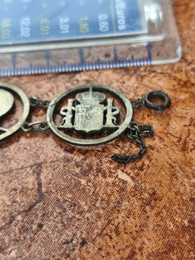 Bracciale a maglie con scudi e profili in argento