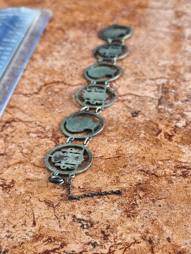 Bracciale a maglie con scudi e profili in argento