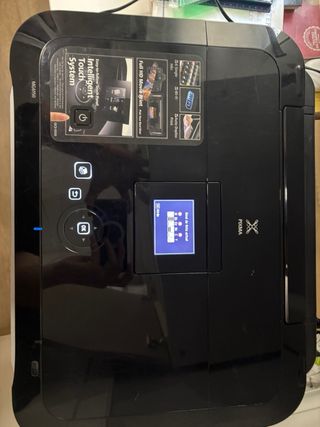 Impresora Canon + 4 cartuchos de tinta