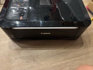 Impresora Canon + 4 cartuchos de tinta