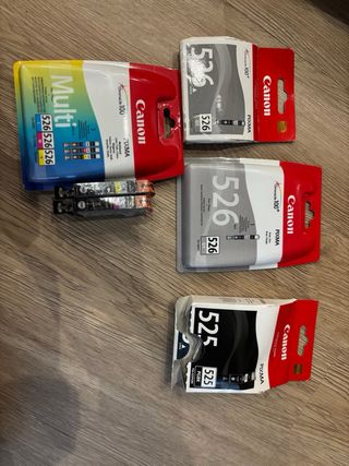 Impresora Canon + 4 cartuchos de tinta