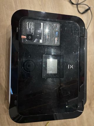 Impresora Canon + 4 cartuchos de tinta