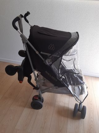 Silla de paseo Maclaren con patinete y saco