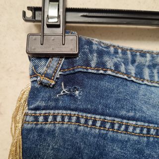 Calças ganga M com franjas douradas