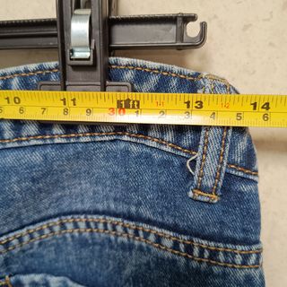 Calças ganga M com franjas douradas