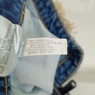 Calças ganga M com franjas douradas