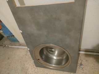 2 encimeras gris cemento con fregadero redondo