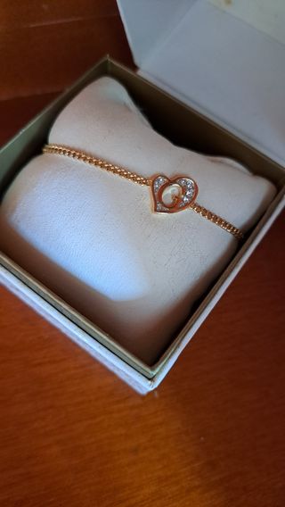 Pulsera Guess Corazón Dorado y Blanco