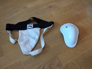 Coquilla deportiva y protector