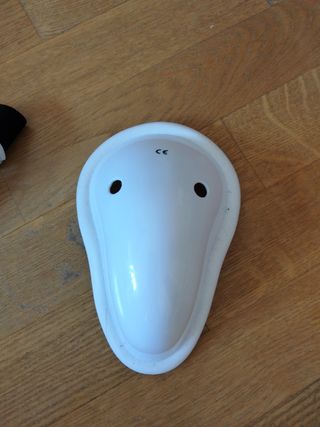 Coquilla deportiva y protector