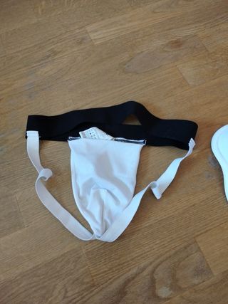 Coquilla deportiva y protector