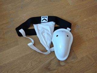 Coquilla deportiva y protector