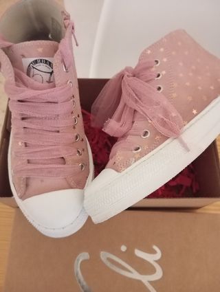 Zapatillas de piel rosa para niña