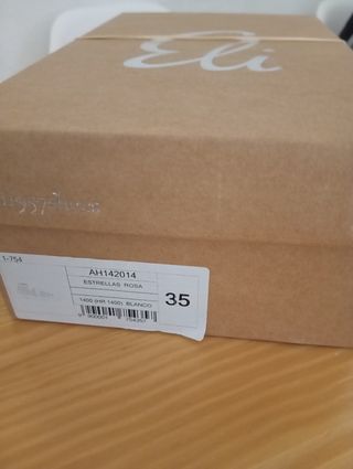 Zapatillas de piel rosa para niña