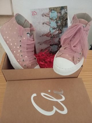 Zapatillas de piel rosa para niña