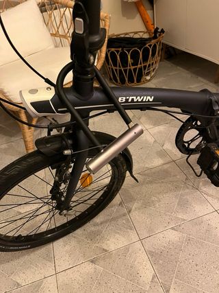 Bicicleta plegable BTWIN con candado e hinchador