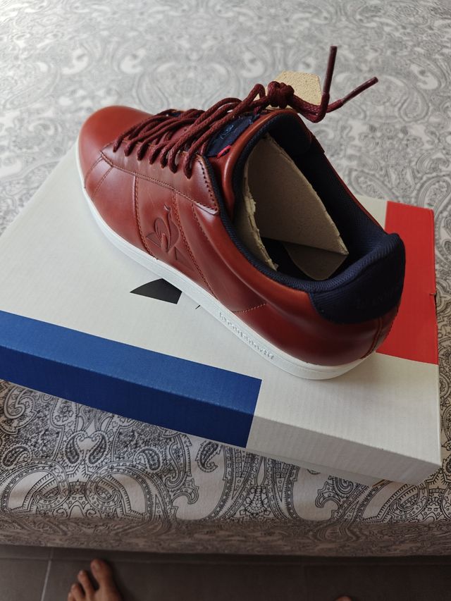 Zapatillas Le Coq Sportif de piel.