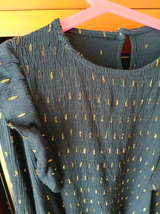 Blusa azul marino con detalles dorados Talla S