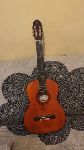 Guitarra clásica Eko CS10 – Naranja brillante.
