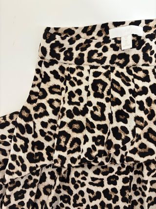 Conjunto XS: Falda Midi Leopardo + Bomber Negra