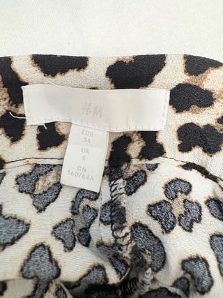 Conjunto XS: Falda Midi Leopardo + Bomber Negra