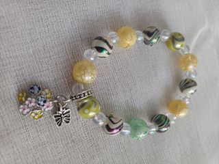 Pulsera elástica con Dije de Flores y Mariposa