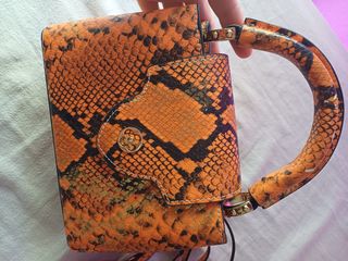 Bolso Louis Vuitton naranja y dorado